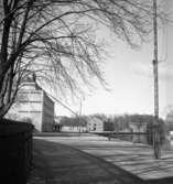 Svartån och parti öster om Örebro slott. Hamnen, Hamnmagasinet.
11 mars 1938.