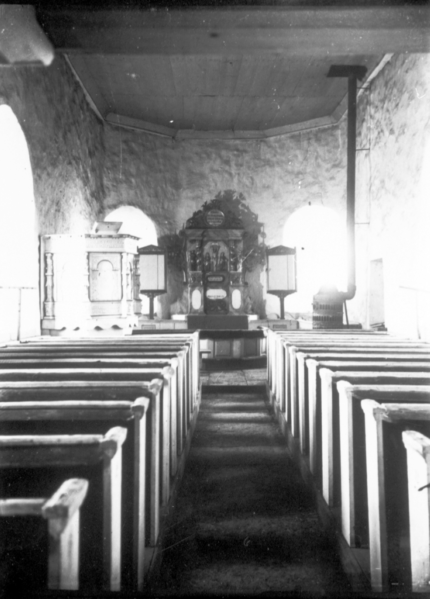 Torsten Field, Interior from Sörby Church. Note the iron stove on the right.