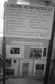 Lindome hembygdsgille ställer ut föremål och fotografier i Lindome bibliotek, år 1984.

För mer information om bilden se under tilläggsinformation.