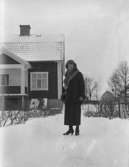 Bostadshus, en kvinna.Stina Karlsson