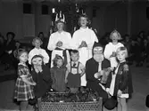 Luciafirande med jultomtar, Uppsala december 1940