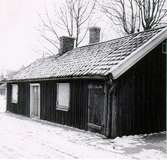 Kv. Plåtslagaren, Repslagaregatan 28. Rivet hus för parkeringsplats.