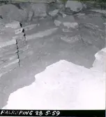 S:t Olofs kyrka. Restaureringen 1958-1961. Resterna av romanska spiraltrappan i torngrundens södra mur. Romanska torngrunden blottad.  Fr. nordväst och fr. nordost.