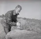 En demonstration i samband med en arkeologisk undersökning vid Nybyåsen.