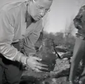 Kanna av brons, funnen i ett röse i Klinta.