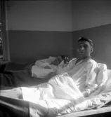 Sängliggande patient på Beredskapssjukhuset.