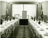 Invigning av Hemvärnsgården i Mölndal år 1953. Fyra okända hemvärnsmän och tre lottor.