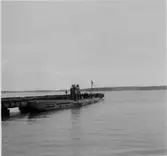 Lennart Wållberg Norrköping var förste kock på ubåten Neptun 1954 Neptuns långresa 1954.
Neptun bunkrar vid Vitså