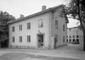 Bild från grossistföretaget Hakonbolagets fastighet år 1937 med adressen Södra Kyrkogatan 7 i Karlstad. Firman var en av grundarna till dagens ICA-koncern.