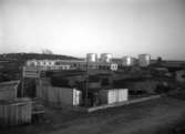 Armerad betong bygger på 30-talet ut oljehamnen söder om Herrhagen. Lamberget i bakgrunden.