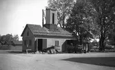 Brandkårens spruthus, uppfört 1884 på nuvarande bibliotekshustomten, rivs år 1938.