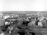 Vy från Herrhagens vattentorn över KMV:s anläggningar, Haga och på andra sidan älven Norrstrand. Bilden togs i början på 1930-talet på uppdrag av KMV.