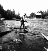 Lenninge. Flottning i Voxna älv.