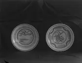 Två handdekorerade skålar från Gefle Porslinsfabrik.