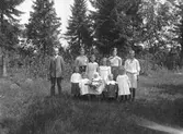 Grupporträtt. Tidsomfånget är 1900 - 1940