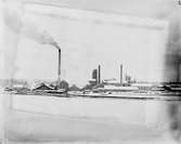 Hammarby Sulfitfabrik / Kopparfors. År 1886 kom en sulfitfabrik att ersätta järnbruket. Den var under en tid Skandinaviens största med över 400 personer anställda.
