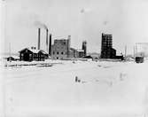 Hammarby / Kopparfors. År 1886 kom en sulfitfabrik att ersätta järnbruket. Den var under en tid Skandinaviens största med över 400 personer anställda.
