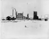 Hammarby / Kopparfors. År 1886 kom en sulfitfabrik att ersätta järnbruket. Den var under en tid Skandinaviens största med över 400 personer anställda.
