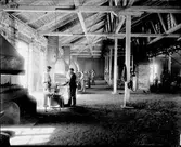 Forsbacka jernverk. Smedjan. Sedan 1600-talet har järnhantering varit ortens huvudnäring. Flera valsverk uppfördes mellan 1872 och 1904
