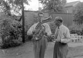 Finländsk orkester på besök. 1 juli 1952.
Kortet taget i Vandrarhemmets trädgård.