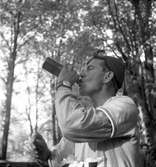 Sverigeloppet. Cyklisterna passerar Gävle. Juli 1952.