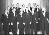S H N:s ordens kör. Mannen i mitten med svart ordensband är fabrikören Gunnar Hedin, som 1941 tog initiativet till att bilda kören och blev dess förste dirigent och ledare.