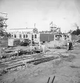 Nybyggen, juni 1943. Tobaksmonopolet i bakgrunden.