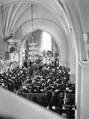 Kontraktsprost Hedberg. Jordfästning i kyrkan. Mars 1944





