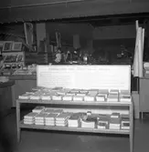 Konsum Alfa. 100-årsjubileum. Bokmonter. Juni 1944