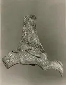 Beslag till sköldbuckla, i silver. Fornfynd från Nabberör.