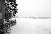 Nybyggen. Södertull / Källbäck. mot bl a Monopolet. Januari 1942