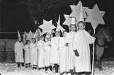 Luciafirande med stjärngossar

13 december 1949

