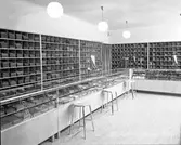 Bredenbergs. Interiör från butiken. December 1936