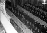 Konsum Alfa och Arbetarbladets pensionärer på fest i Stadshuset. 6 januari 1945.