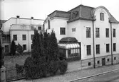 Foto av fastighet tagit från Norra Köpmangatan. November 1944. Direktör Rolf Zedrén.