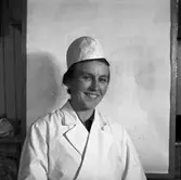 Okänd kvinna på konsum