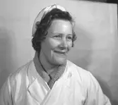 Okänd kvinna på konsum