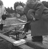 Inmurning av dokument i grunden på Nynässkolan.           26 september 1948.
