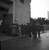 Reportage för Gefle Dagblad. Stadsfullmäktigeval 1938 i Sankt Ansgars hus


