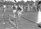 År 1938.Stafettväxling löpning. Stadsloppet. Reportage för Gefle-Posten
