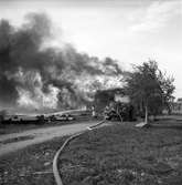 Brand i Olssons lumpupplag vid vagnsverkstaden. Maj 1947.