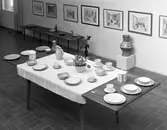 Utställning med diverse föremål.  Den 24 april 1956
Bobergs Fajansfabrik AB.
