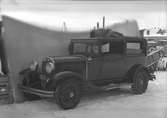 Juhlins verkstad, sönderkörd bil. En 1929 Chrysler 2 dörrar.