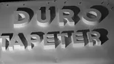 Duro Tapet, Bokstäver
