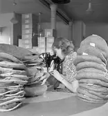 L. Haglund & Co, med varumärket Elhå. Grundades som en affär för mössor, hattar och pälsvaror av Lars Haglund 1872.