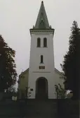 Dalhems kyrka, gaveln med kyrktorn och fönster. Foto från renoveringen 1993.