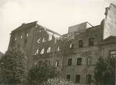 Ångkvarnsbranden 1935-07-06. Fasaden mot Proviantgatan, dagen efter.
