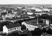 Utsikt över Gävle med bl.a Läroverket, Freja och Teatern