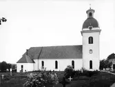Valbo kyrka är Gästriklands äldsta kyrka. Genom den uppländske runristaren Åsmund Kåressons runstenar i östra Gästrikland att där fanns kristna i mitten av 1000-talet och att en kyrka i trä uppförts under 1000-talet. Området där kyrkan står heter Torsvallen platsen kan ha hyst ett tempel helgat åt asaguden Tor. Resterna av en stenkyrka, en absidkyrka återfinns under den nuvarande kyrkan, är från 1100-talet och daterades vid restaurering 1955-1956. Den nuvarande kyrkan började byggas är oklart. Enligt museiintendent O. Källström uppfördes den under 1300-talet senare hälft, medan docent B. I. Kihlström menar att kyrkan påbörjades i slutet av 1200-talet. Från denna period kvarstår koret och den östligaste delen av långhuset. Riksantikvarieämbetets register anger att långhuset är uppfört under perioden 1150–1199 och ut- och tillbyggt med kor under perioden 1270–1329. Förutom högaltaret hade kyrkan två sidoaltare, det södra helgat åt Johannes Döparen, till vars ära kyrkan invigts och det norra sannolikt till Maria. Under 1700-talet byggdes kyrkan ut med sakristia 1736, ytterligare ett valvkvarter 1742–1743 och ett torn 1776–1777, arkitekt Olof Tempelman till vilket kyrkklockorna flyttades från den tidigare fristående klockstapeln.

