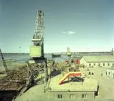 Stapelavlöpning. 18 april 1961. Gävle Varv anlades 1873. Efter en konkurs 1921 bildades Gefle Varfvs och Verkstads Nya AB, som bland annat tillverkade oljecisterner och utrustningar till pappersmassefabriker. På 1940-talet återupptogs skeppsbyggeriet.